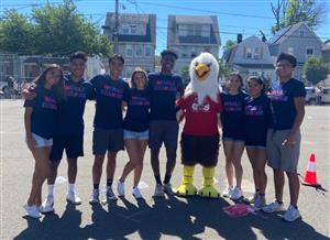KHS Track athletes with the Eagle mascot