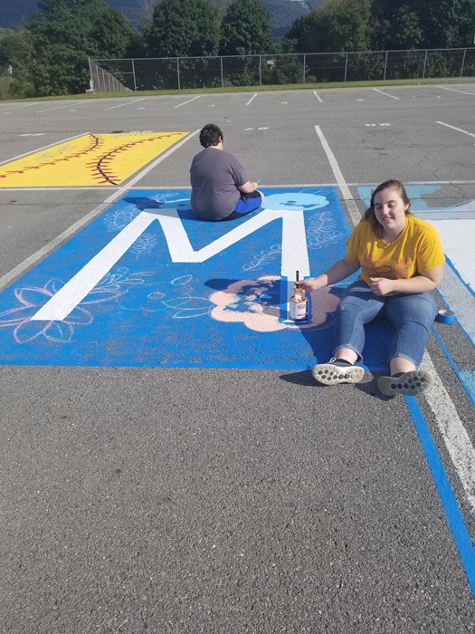 Seniors Painting Parking Spots