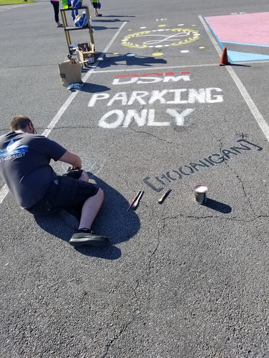 Seniors Painting Parking Spots