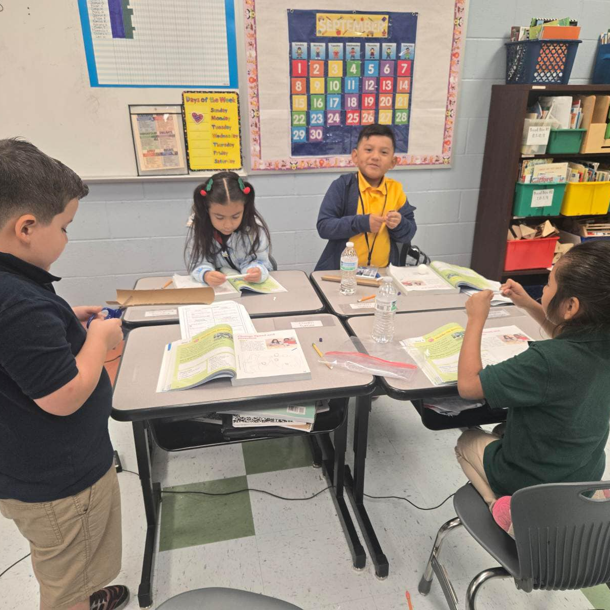 Mrs. Morales first grade class are building ramps to explore the concepts of motion