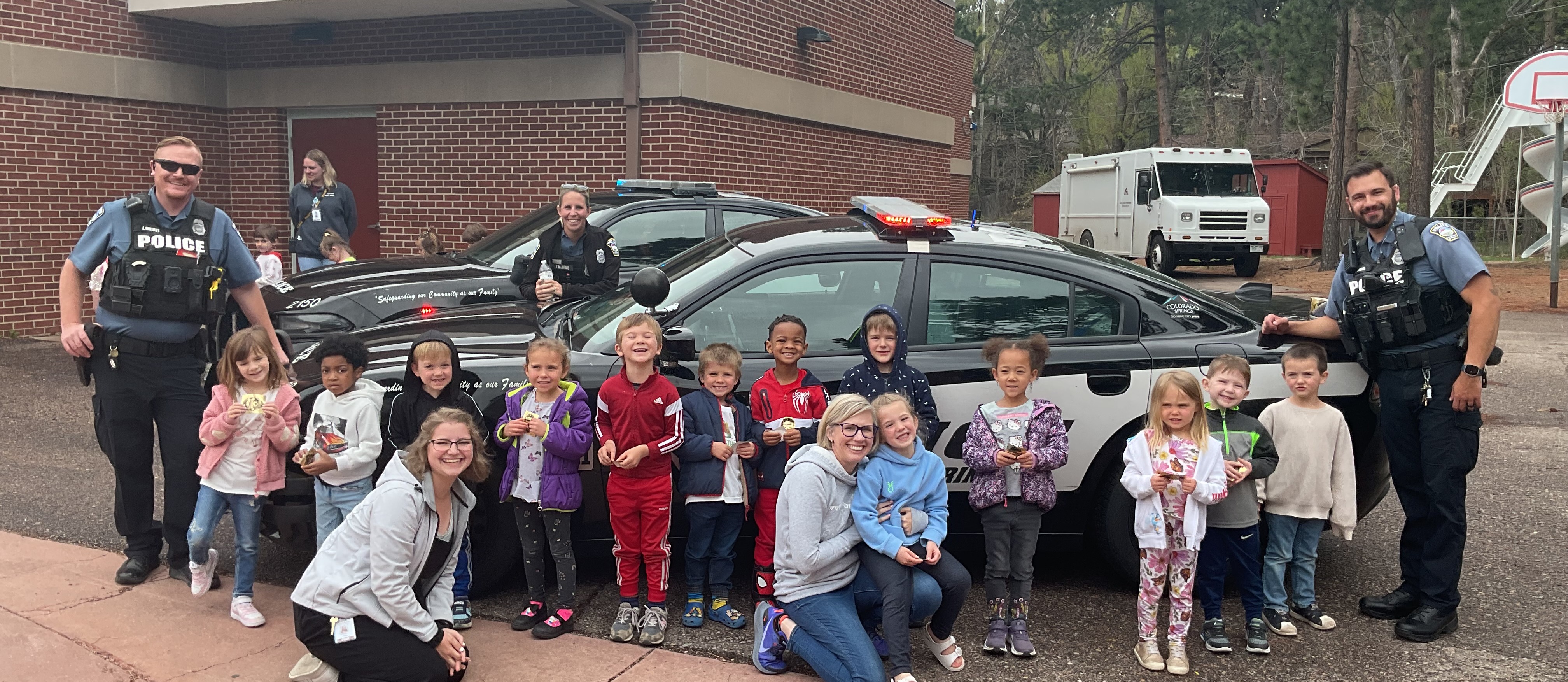 Students learning about a career as a police officer
