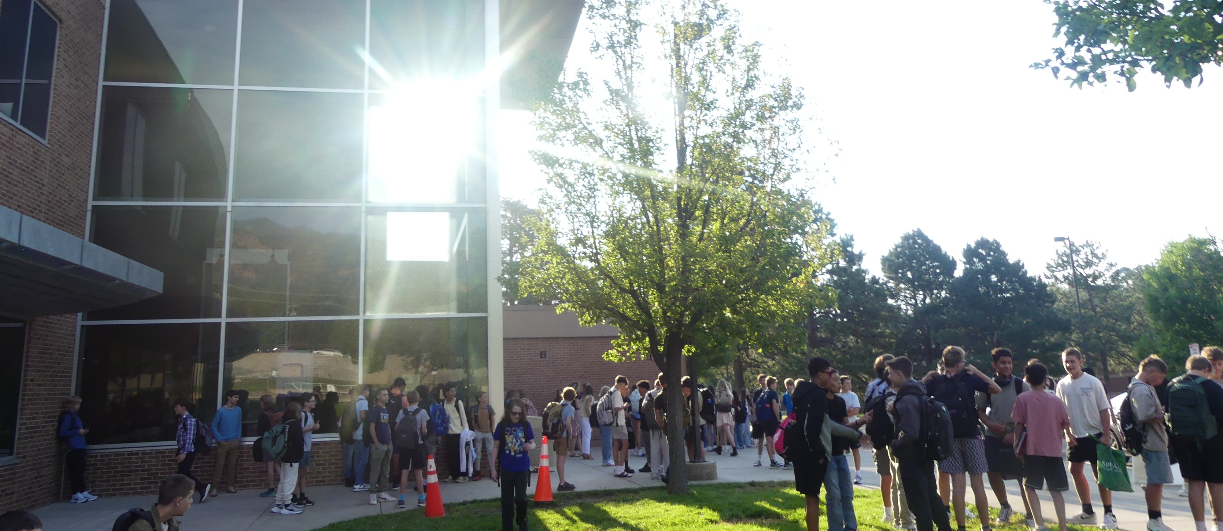 front of JH with students