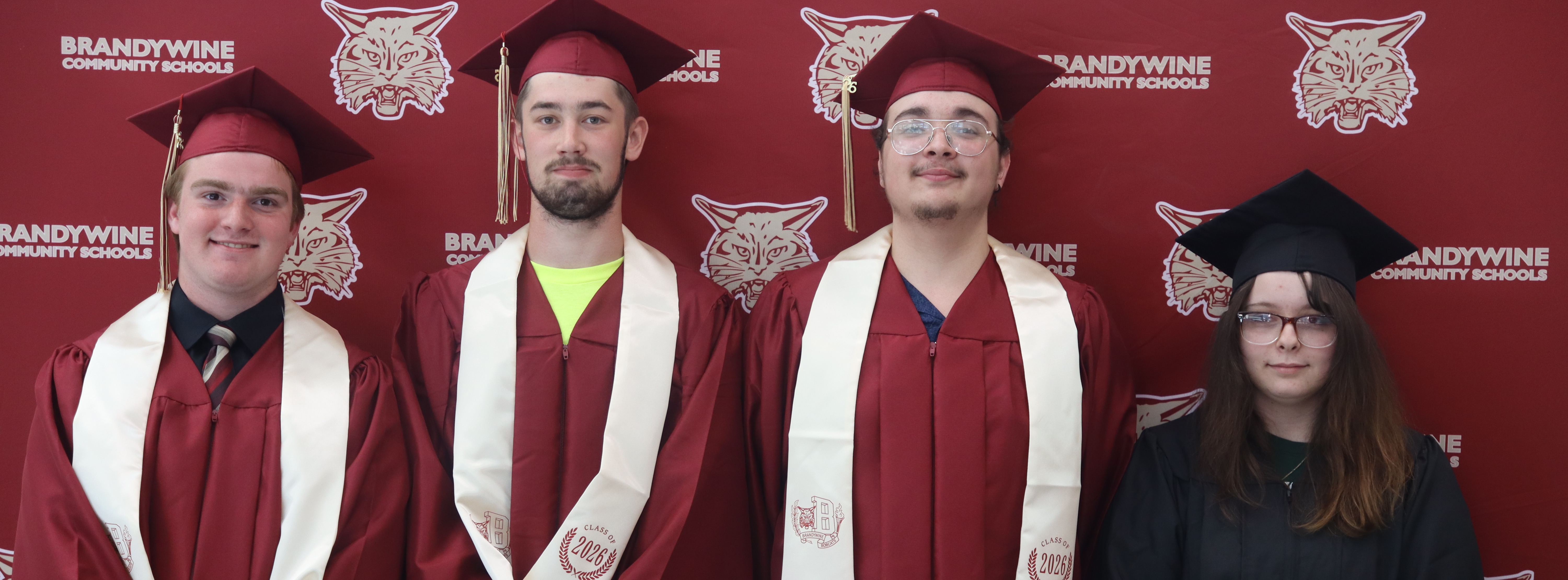 group of four graduates