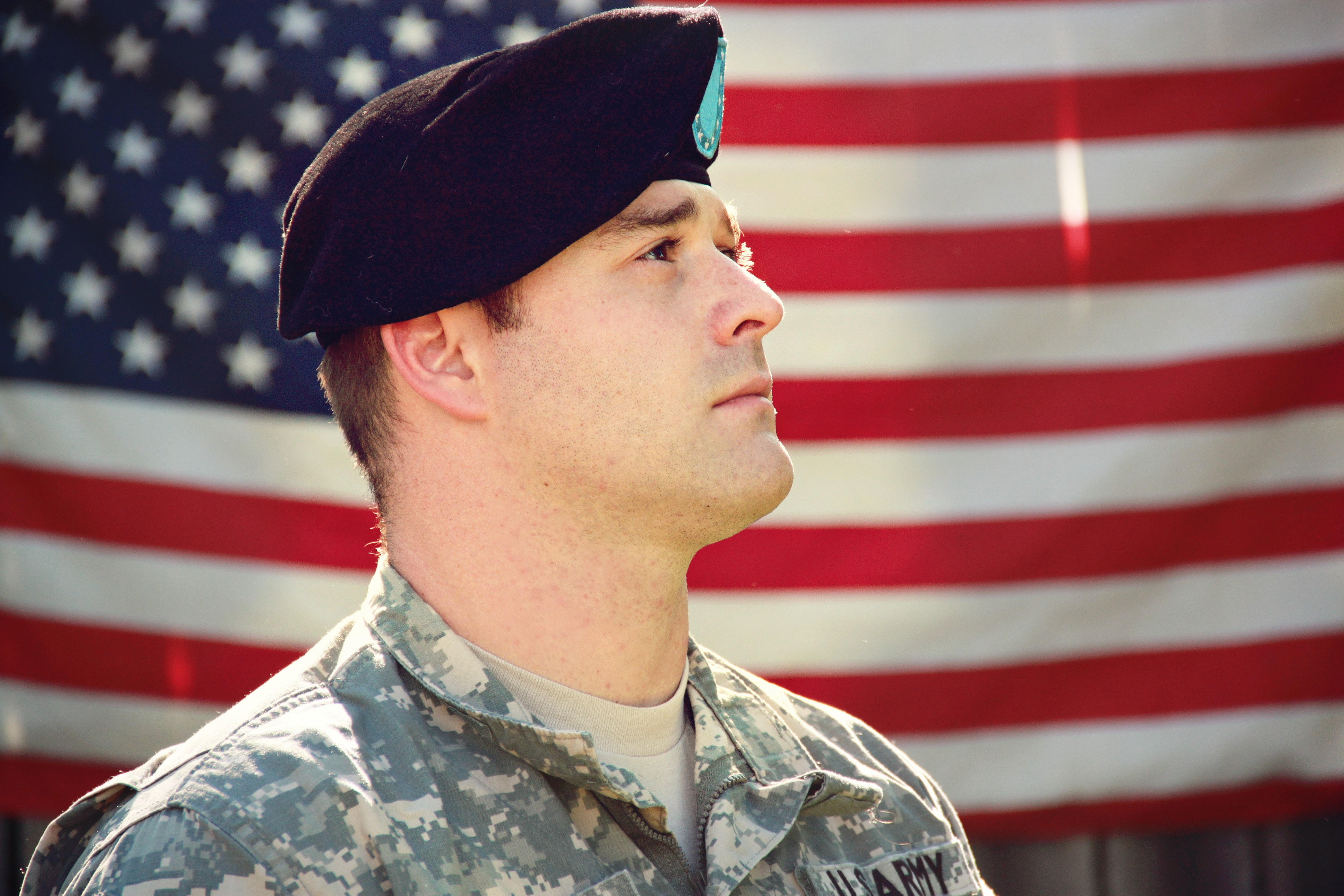 solider's face in front of american flag