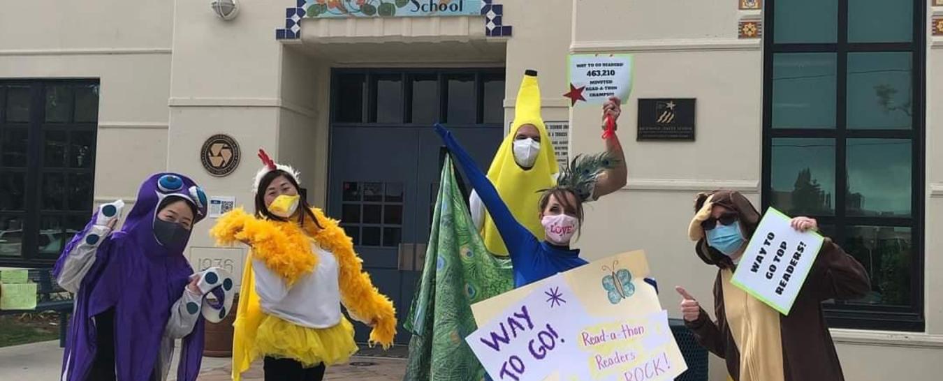 Teachers dressed in costumes