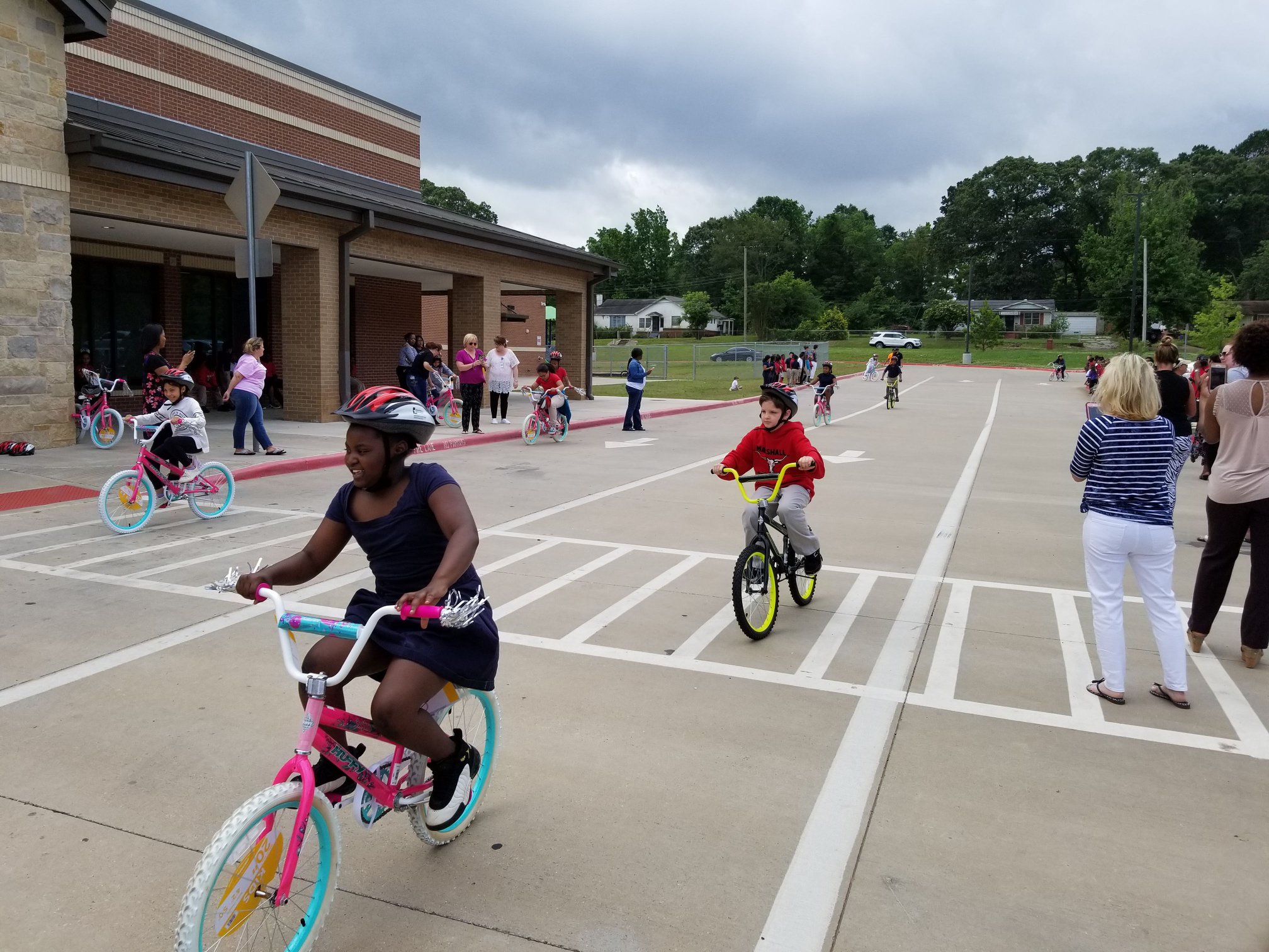 Student riding bikes from Read 2 Ride Program