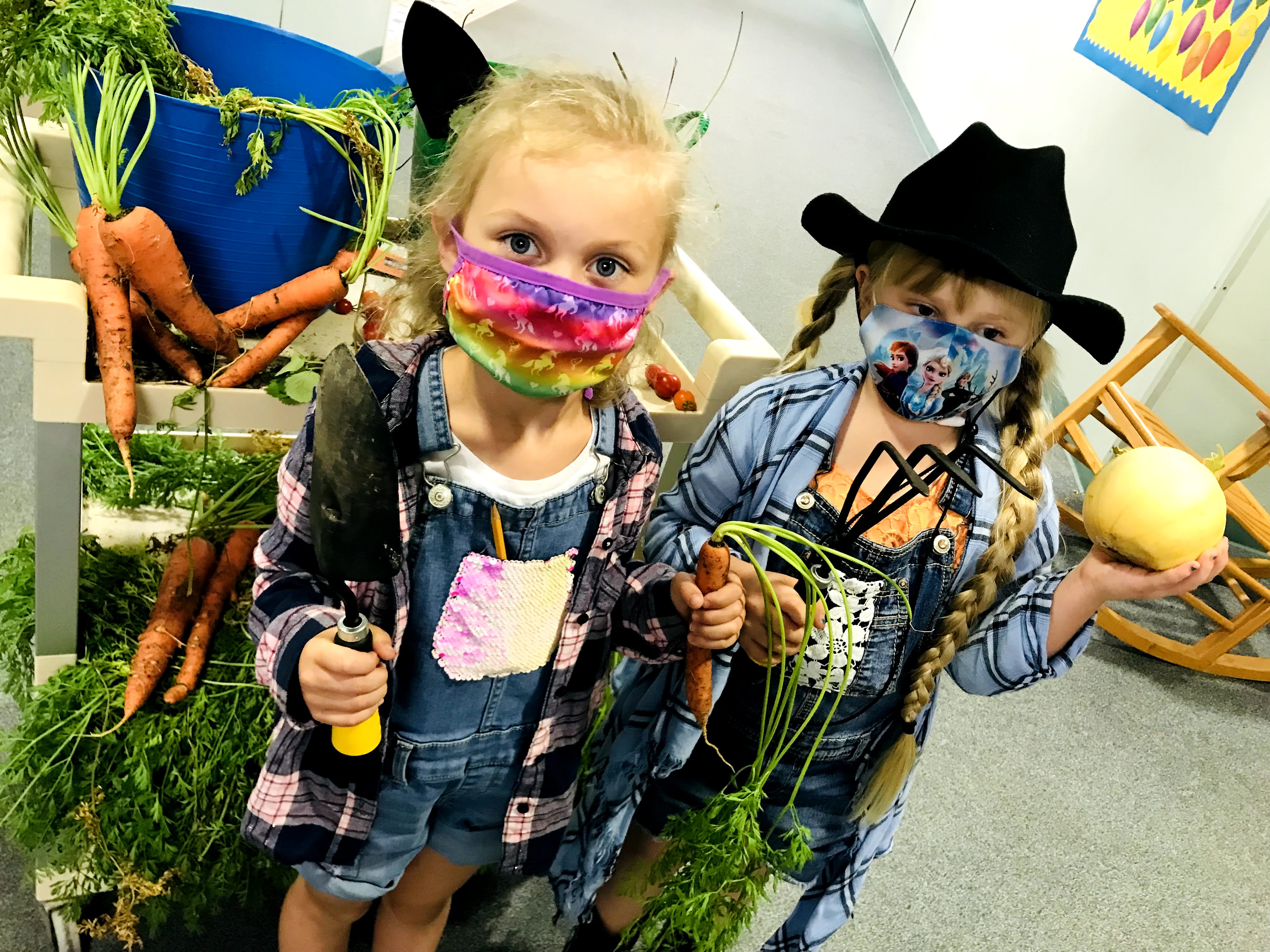 Two students dressed as farmers