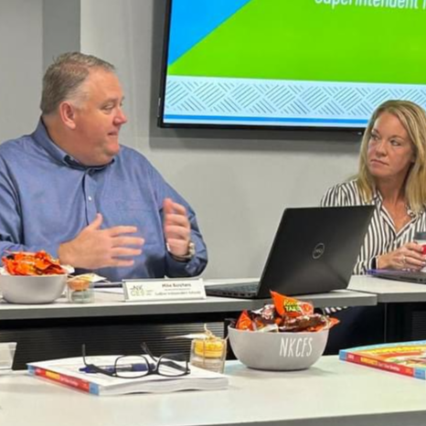 Board members in discussion