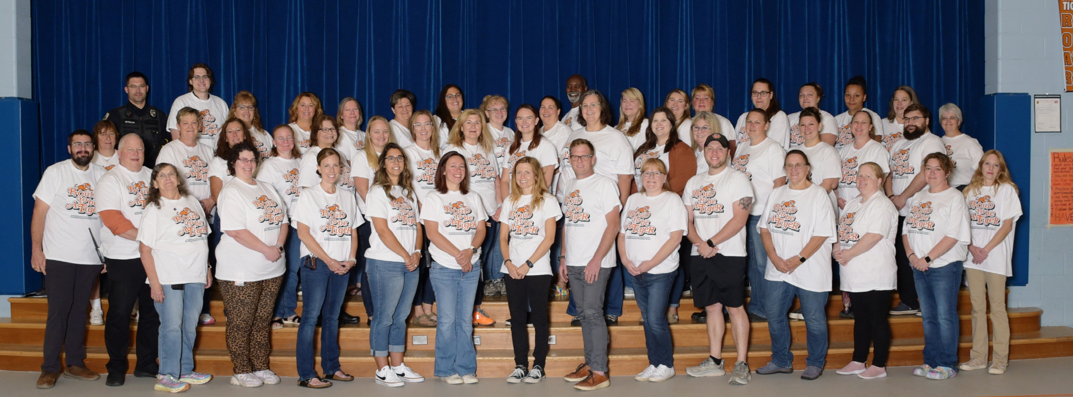 group of staff wearing matching shirts