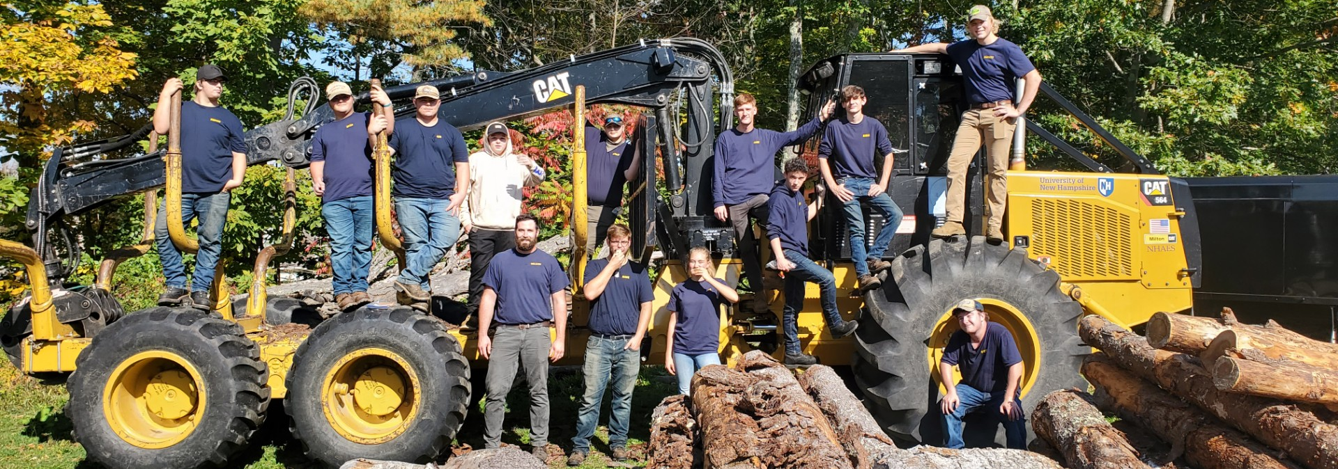 NR/Forestry students posing on a tractor