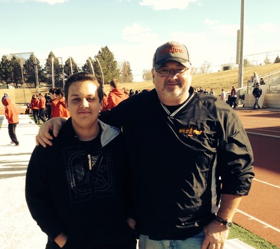 Coach Featherstone and Austin enjoying 1st place in discus at the Trinity JH Meet April 24, 2014 Badlands Conference Champ in the Discus