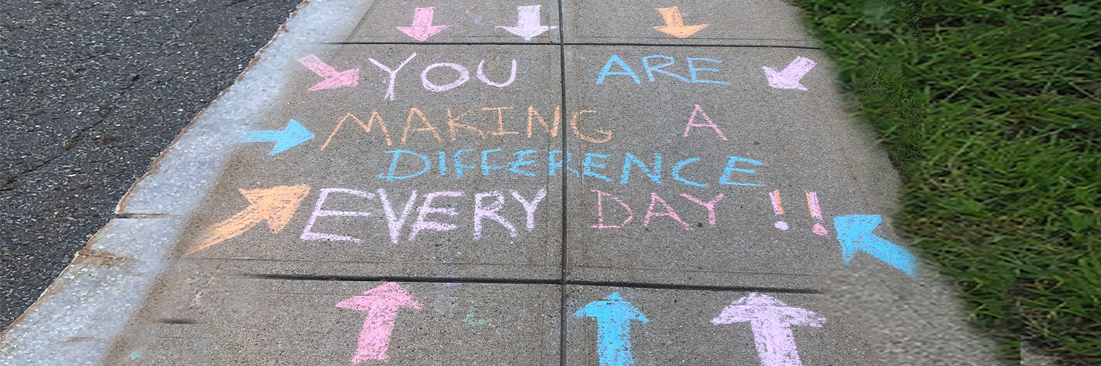 "You are making a difference every day" chalk message