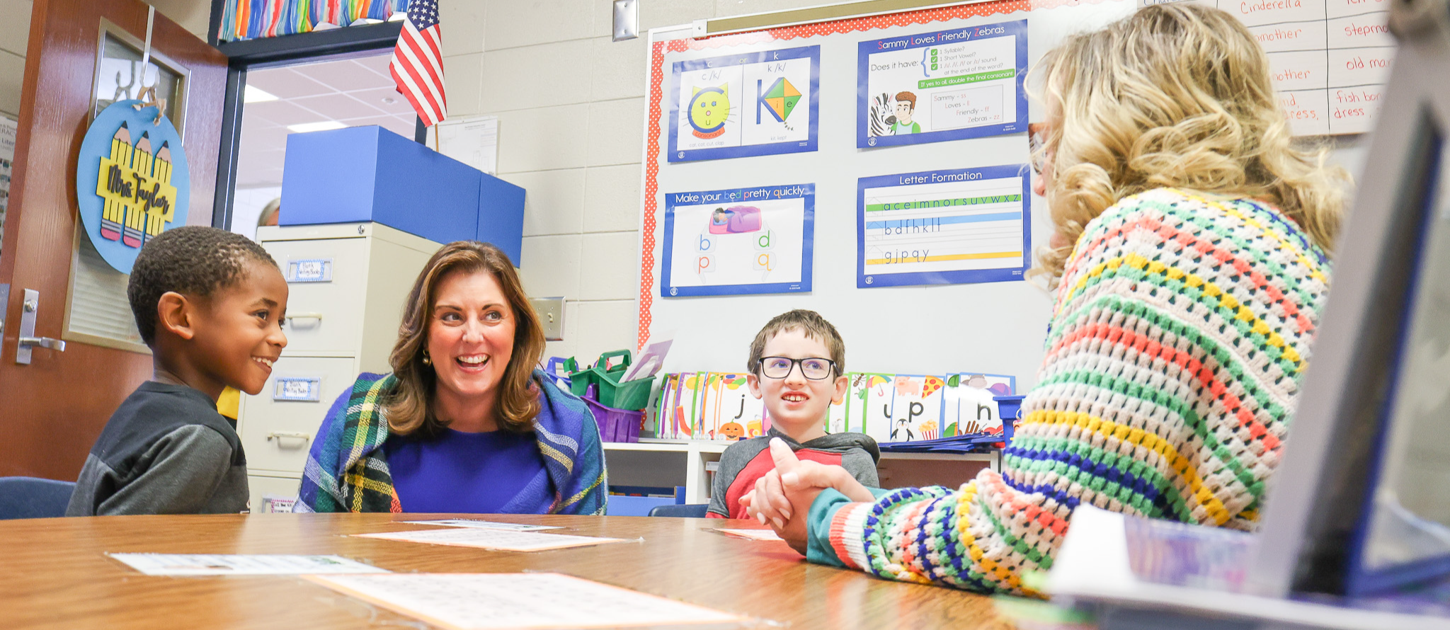 S.C. Superintendent Ellen Weaver speaking with elementary children and Ms. Tracy Taylor, Teacher