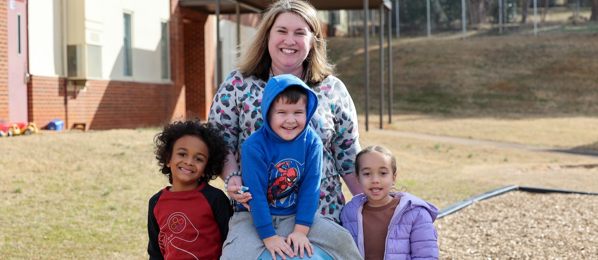 Dr. Pitts with elementary children