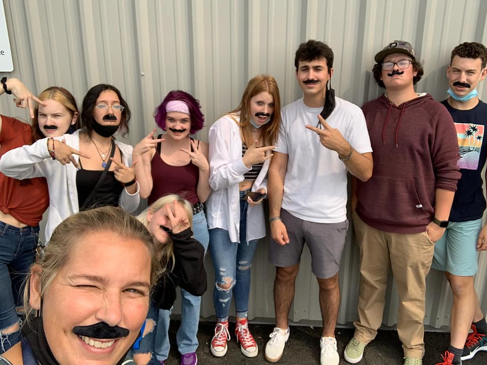 students wearing mustaches