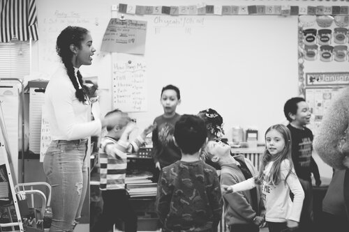 students interacting at black history month celebration