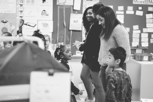 students interacting at black history month celebration