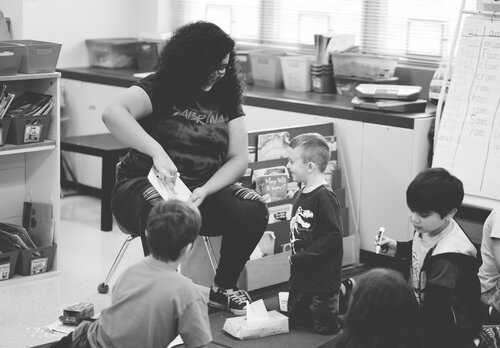 students interacting at black history month celebration