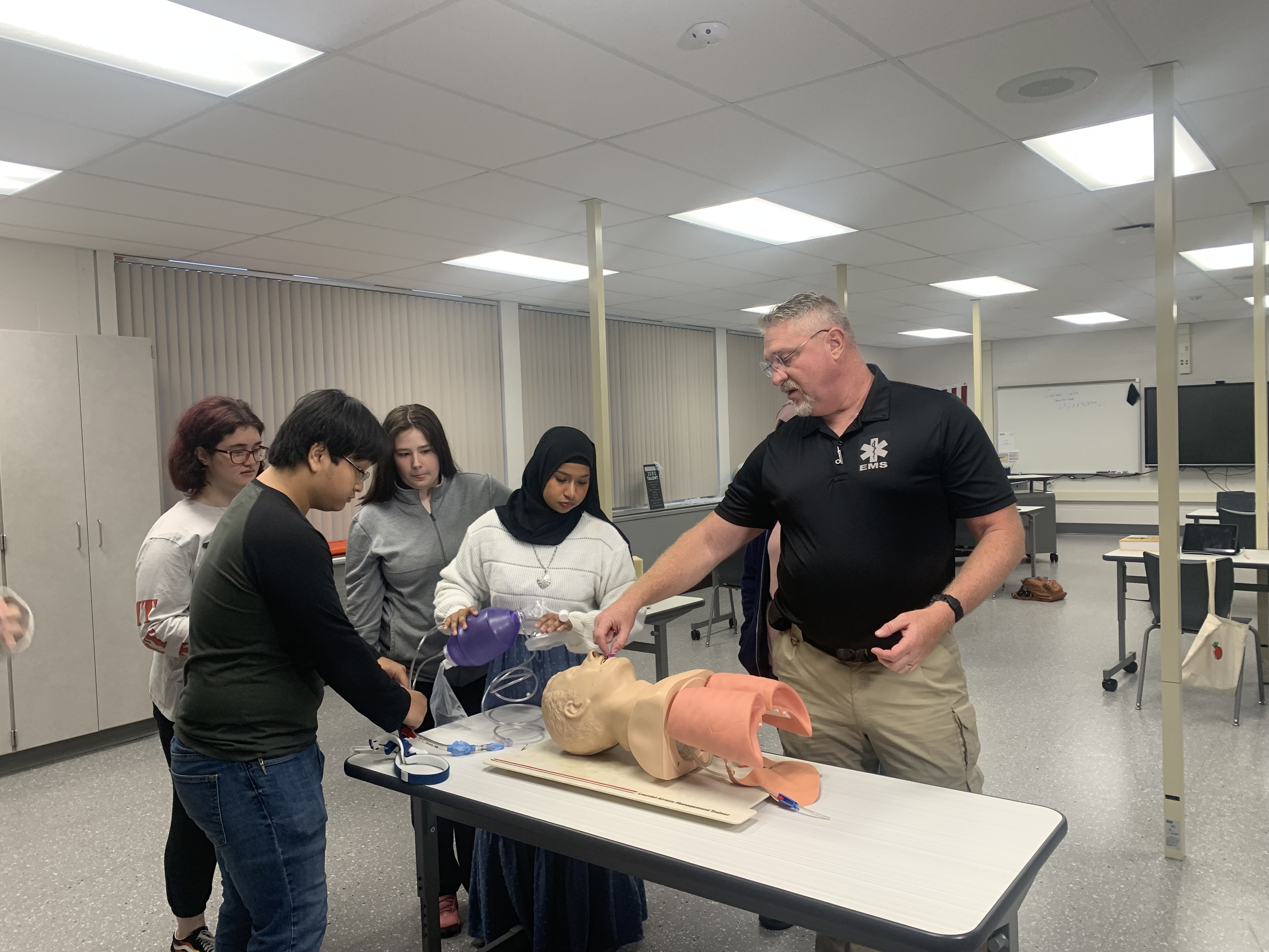 Career Center students learning CPR