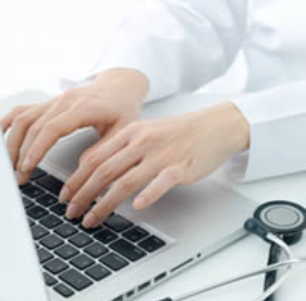 Medical Professionals hands on keyboard 