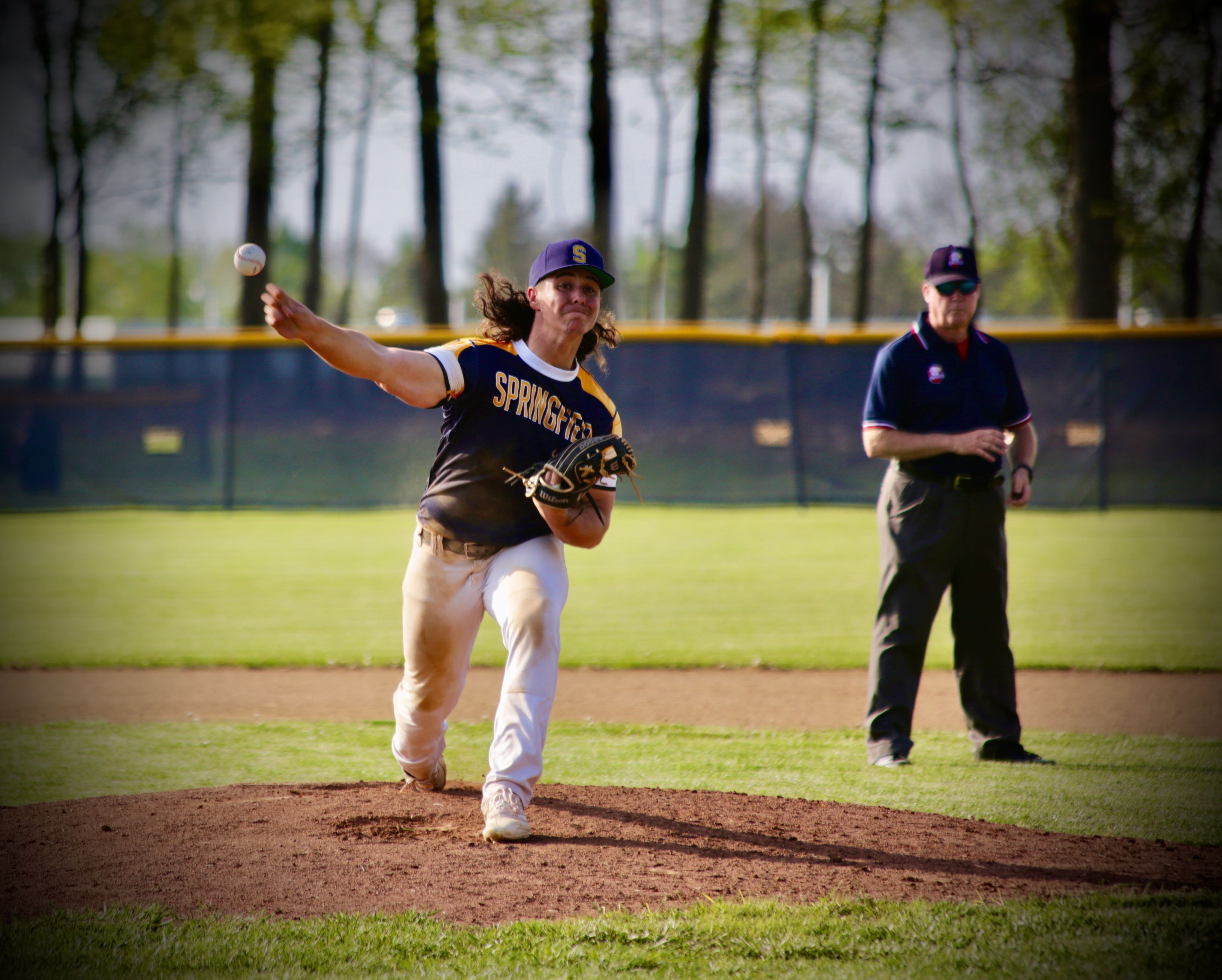 SHS Baseball Players throws a pitch during a game