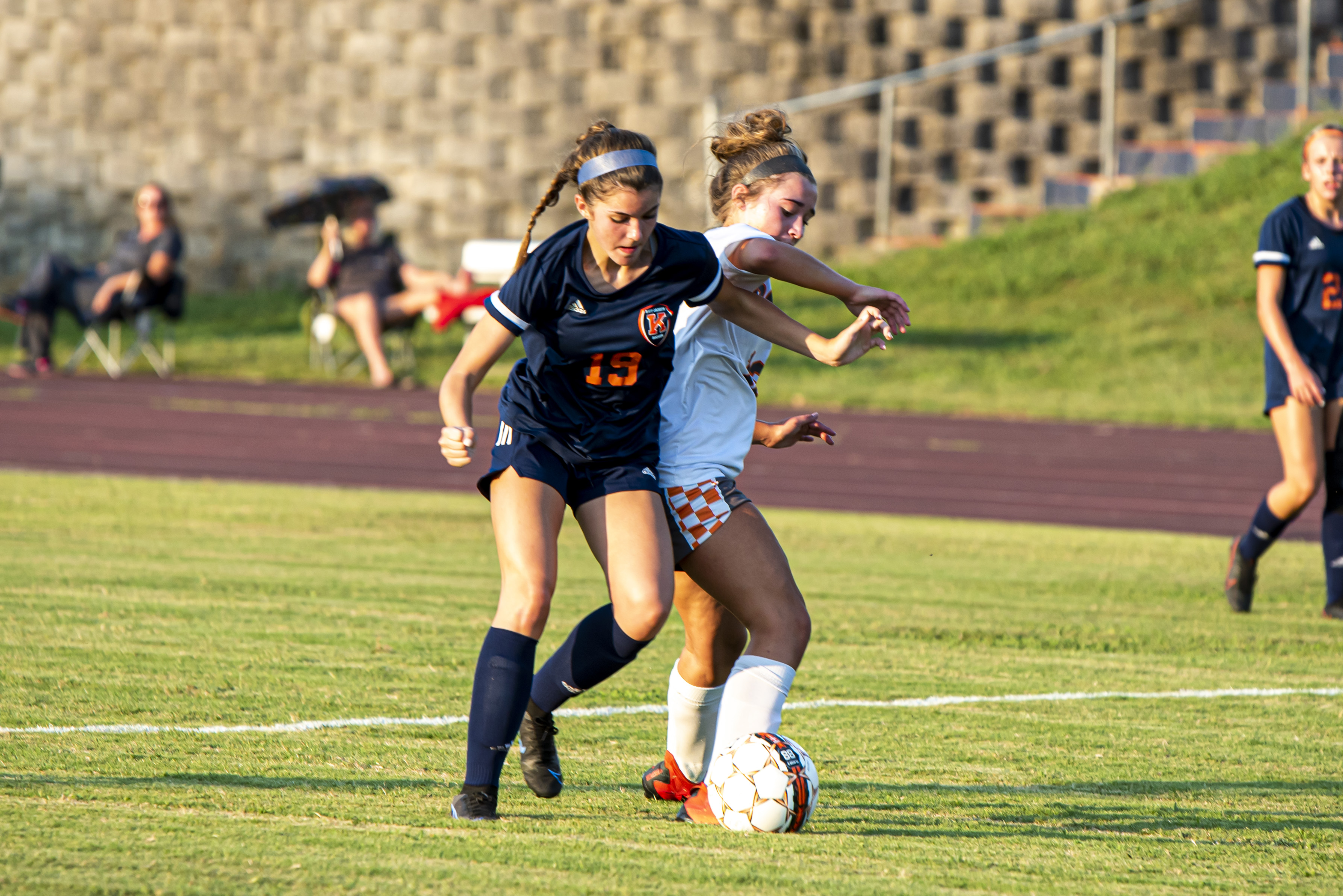 Soccer player against opponent