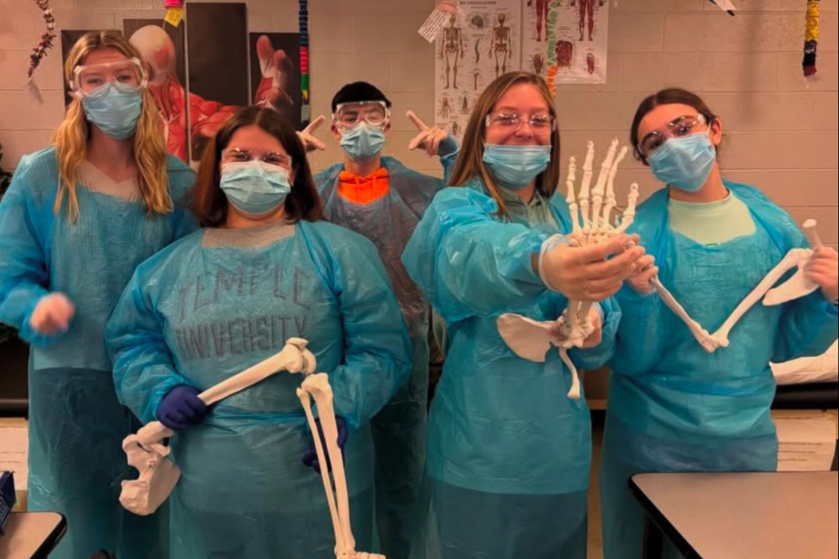 Rehab Aide students working on a project in the classroom.