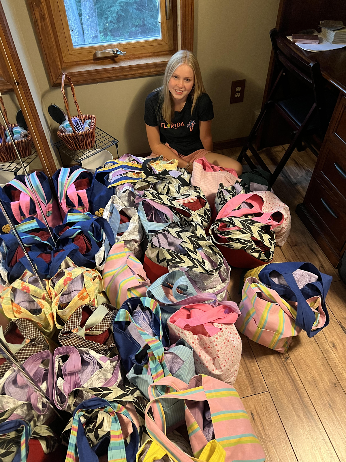 Ashley McKinley with her 33 Bags designed for youth in Foster Care. 