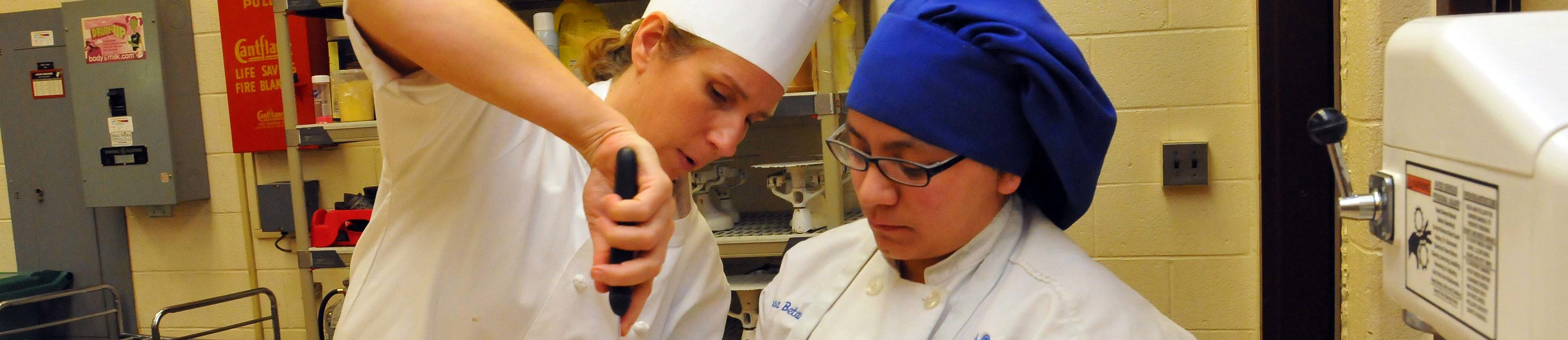 Two chefs cooking