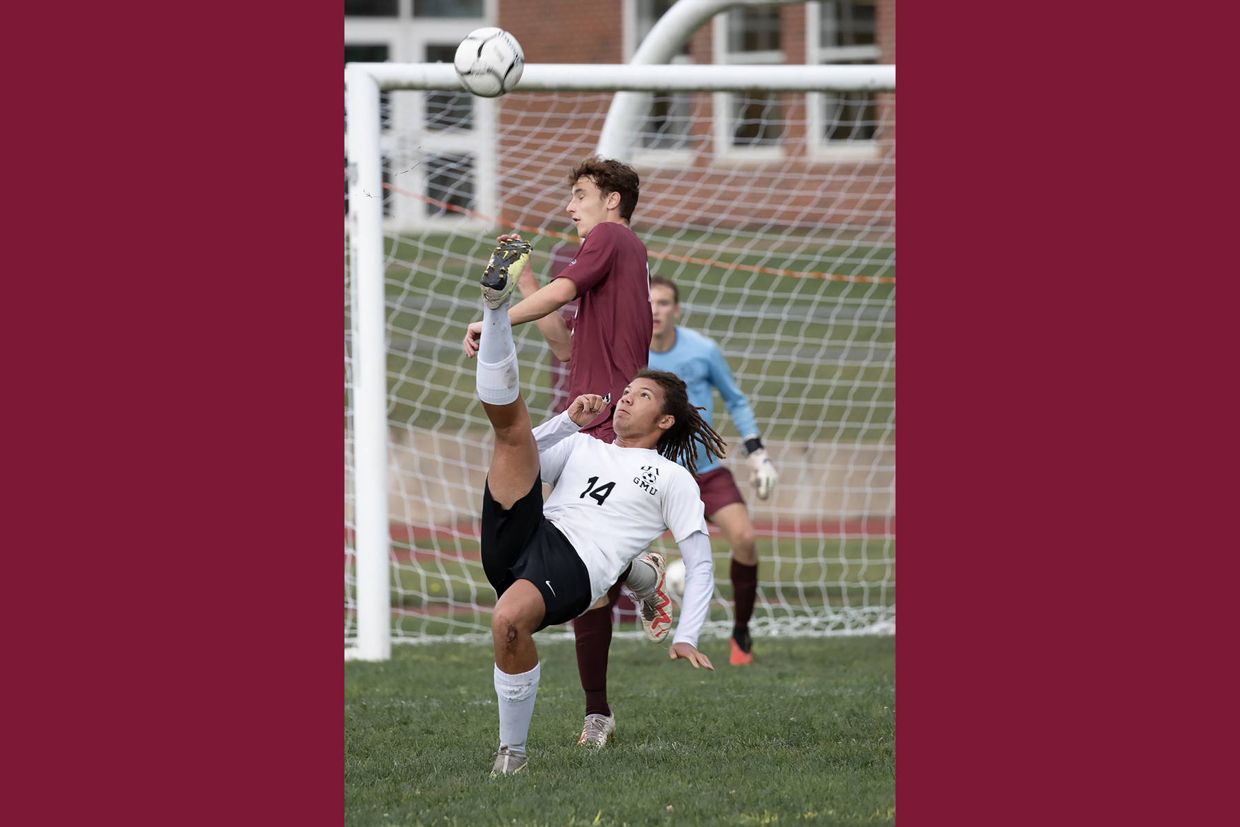 boys playing team soccer