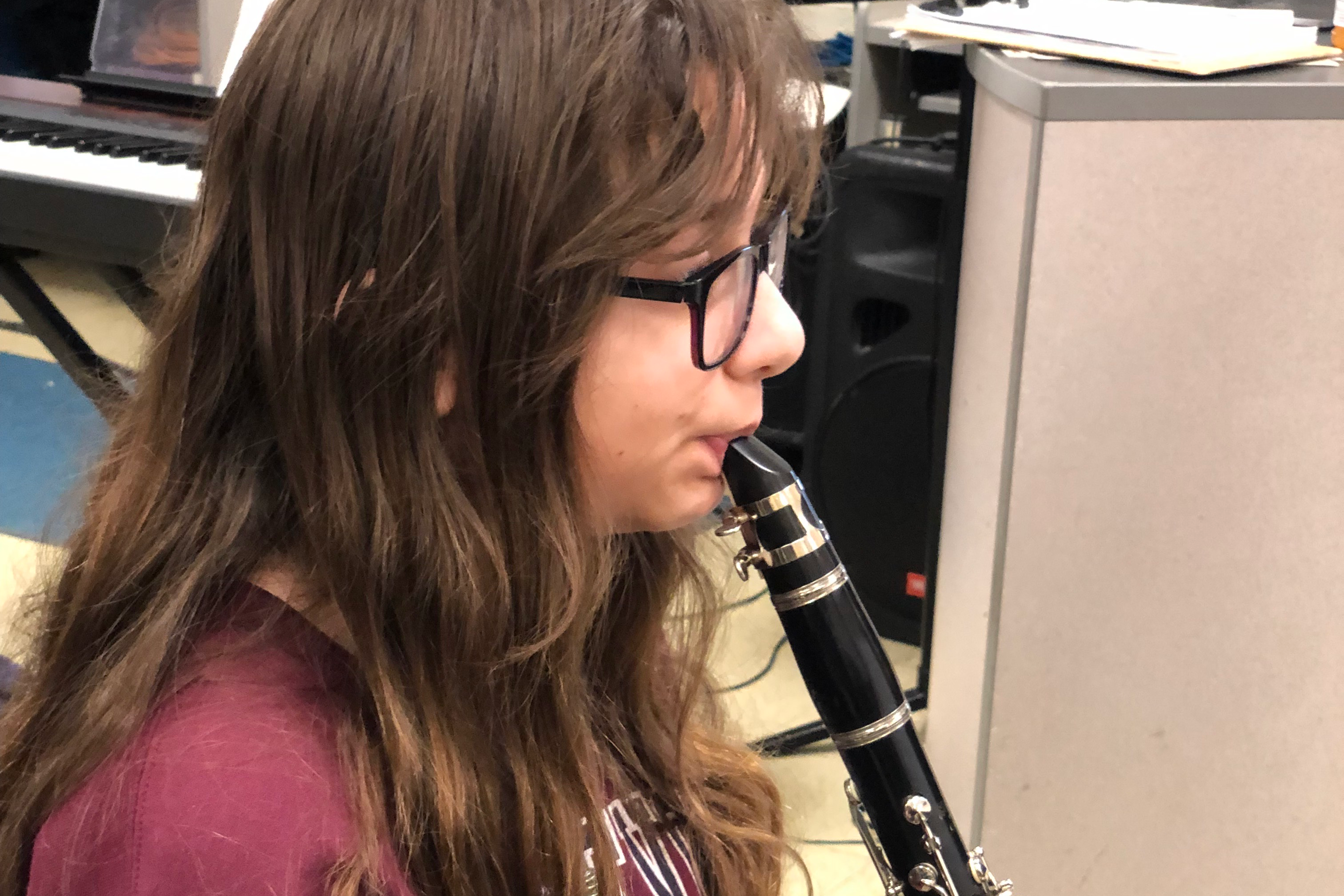girl playing clarinet