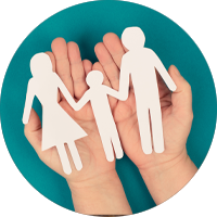 Circular thumbnail of two hands holding paper cut outs of parents and a child