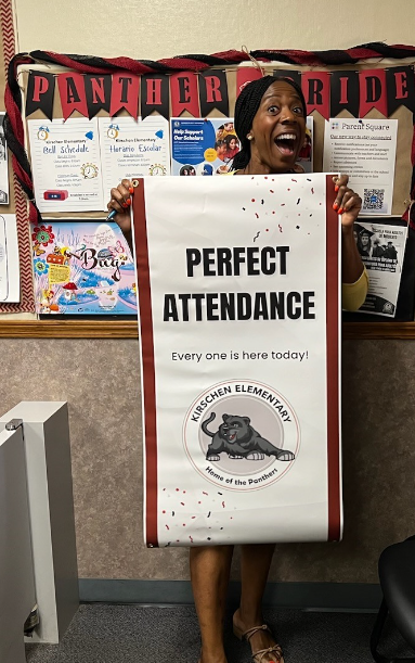 Kirschen Principal Millie Jackson celebrating the classes where students demonstrated their perfect attendance.