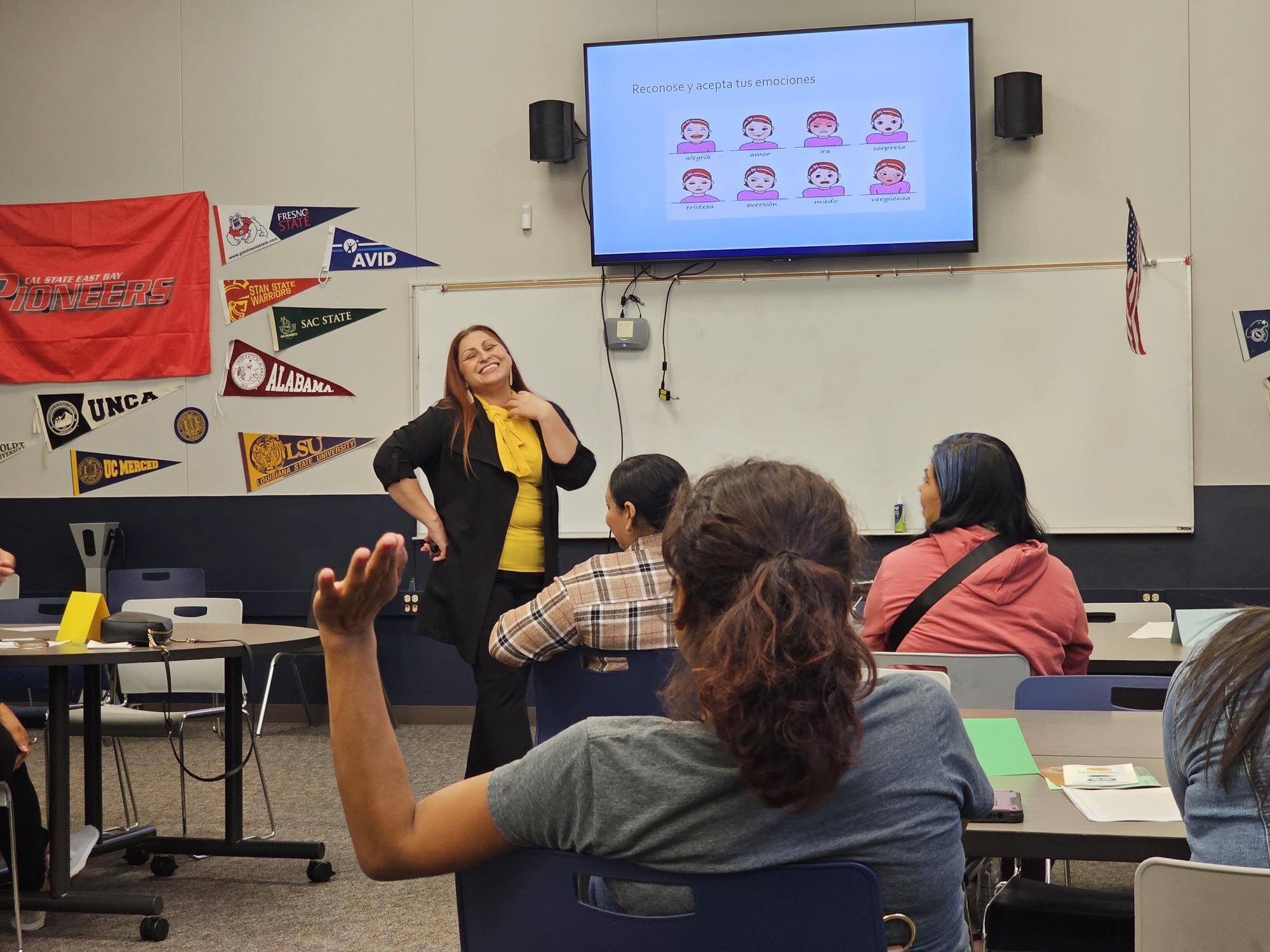Presenter presenting to parents in meeting