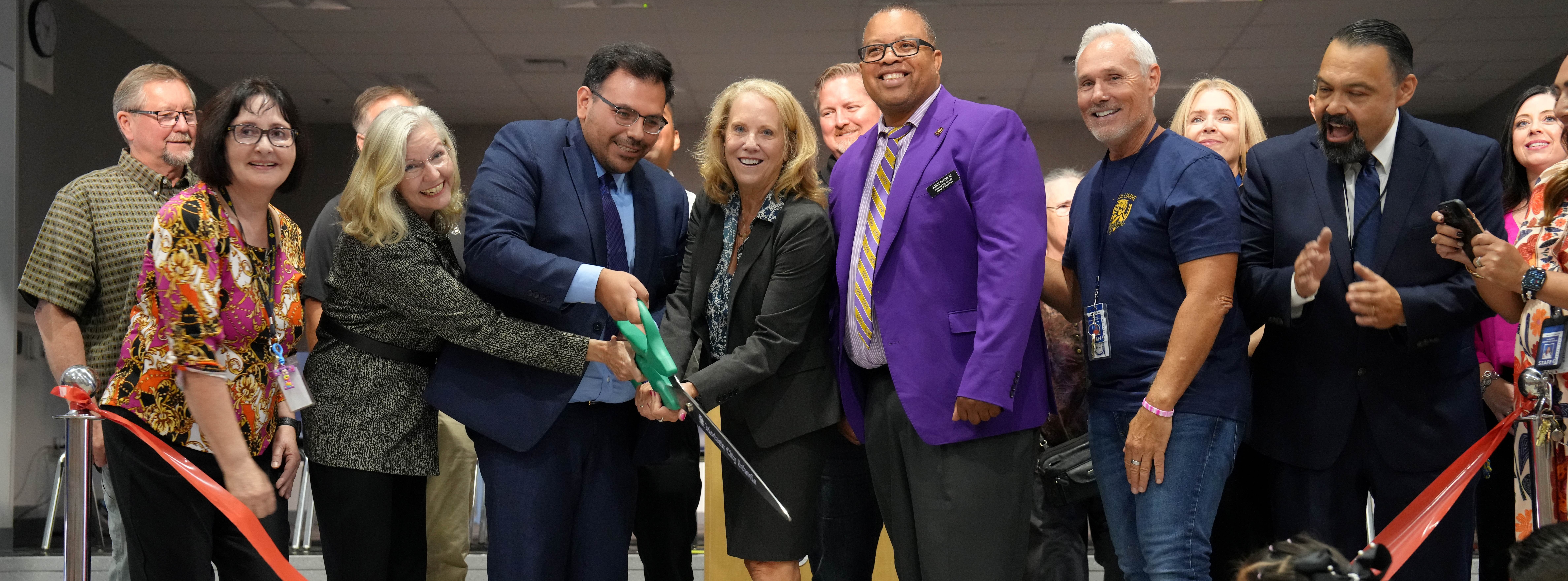 Superintendent Dr. noguchi, board trustees, Tuolumne Principal Anthony Arista and others celebrate opening of new gym at Tuolumne TK-8