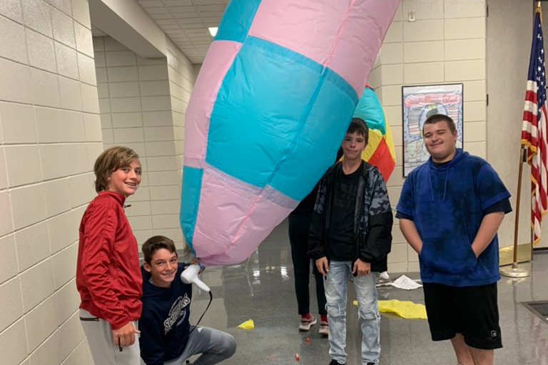 Students inflating a hot air balloon