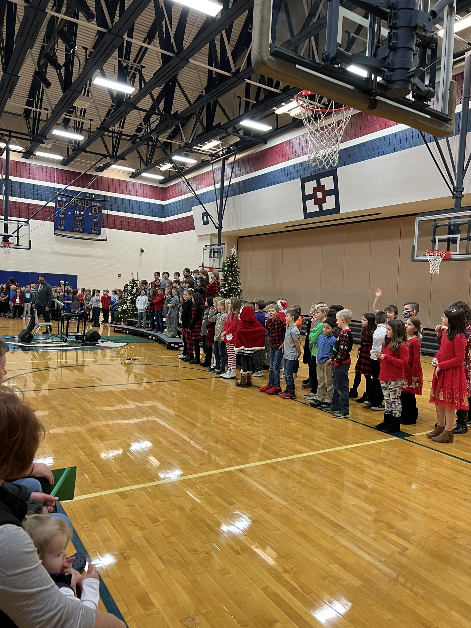Students on risers and lined up for a Christmas concert