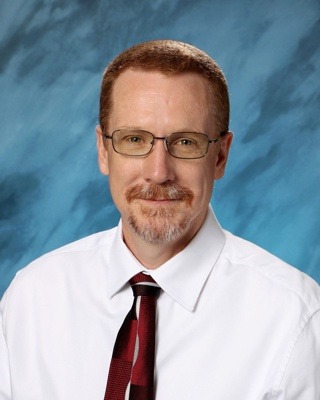 Portrait photograph of doctor Troy Spetter