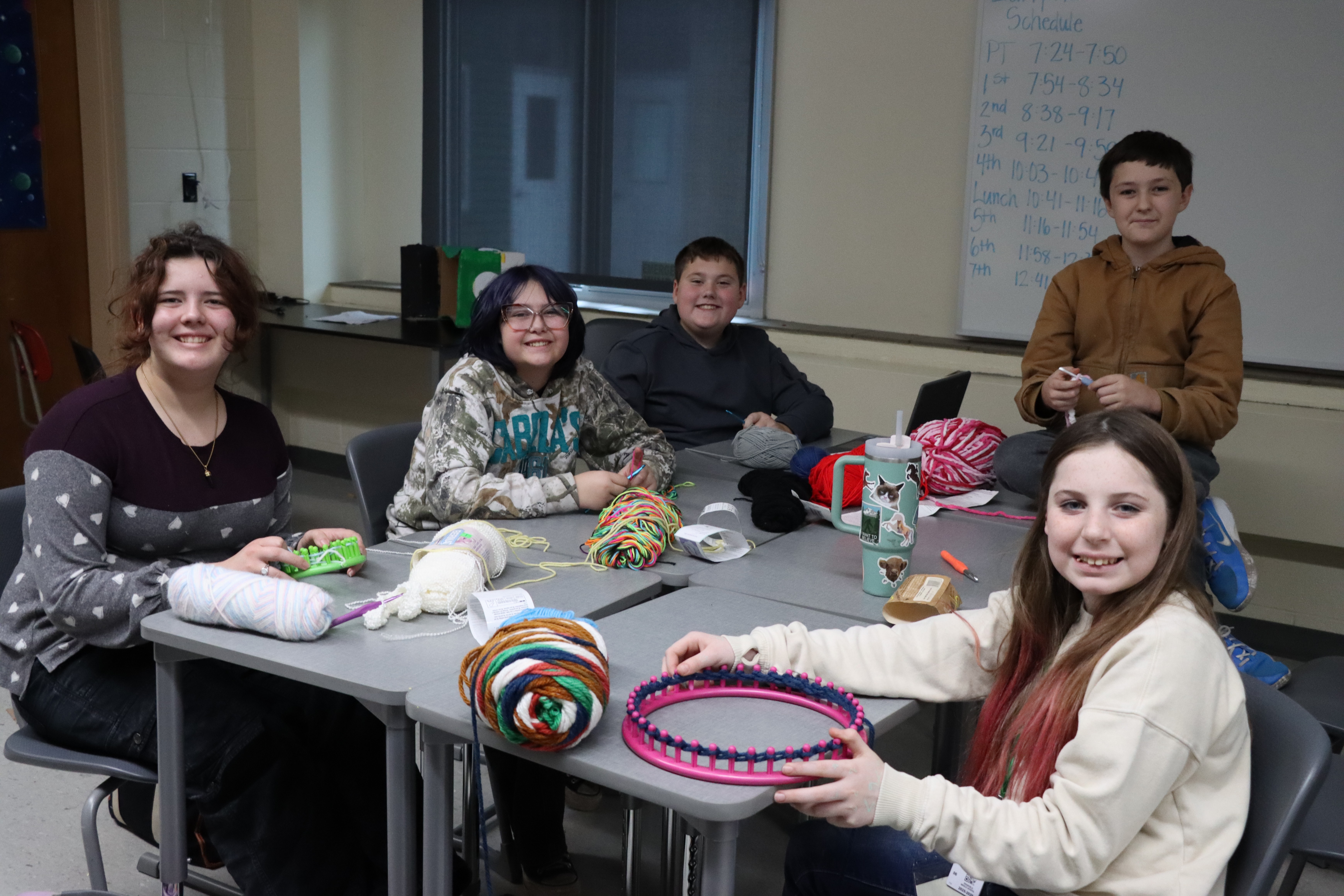 Students knitting at desks