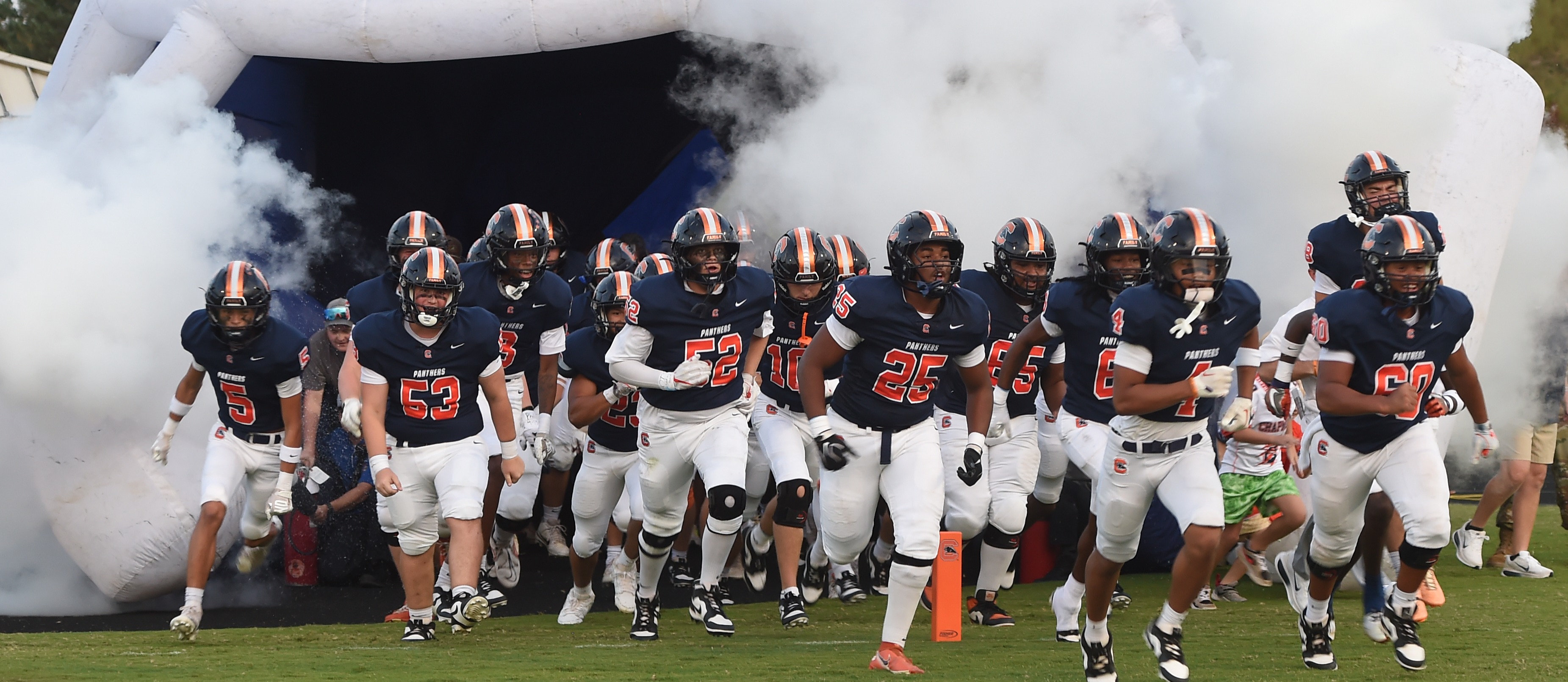 Chapman Football Players entering the field