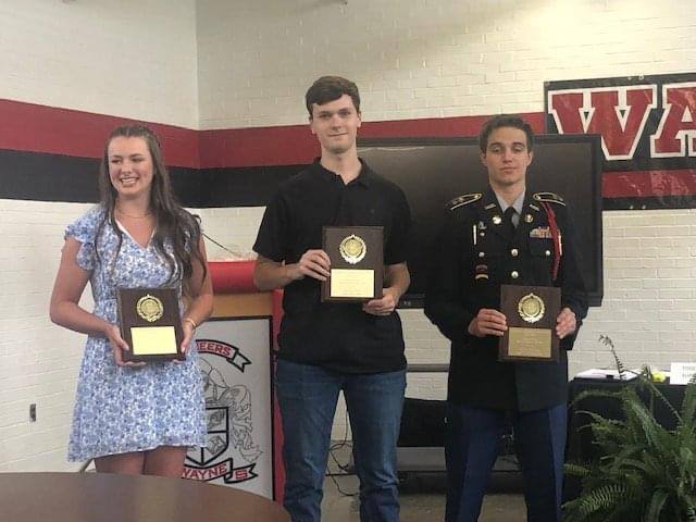 CTE Female Student of the Year Anna Fry (Wayne High), CTE Male Student of the Year Elijah Fox (Tolsia High), and JROTC Cadet of the Year Adam Jeffers (Spring Valley High). 