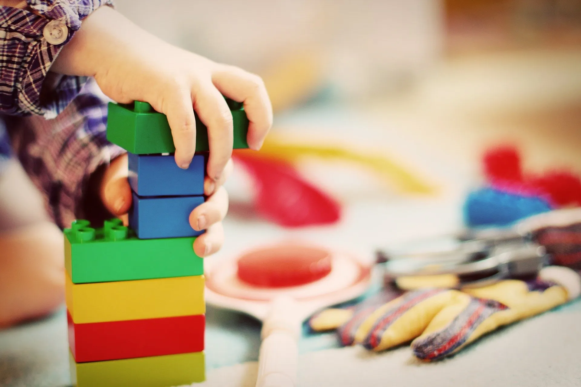 Student playing with legos