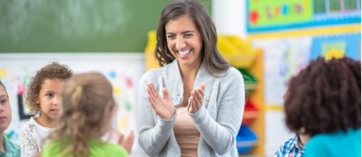teacher laughing with kids