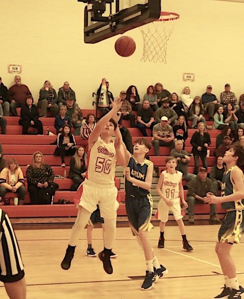 Students playing basketball