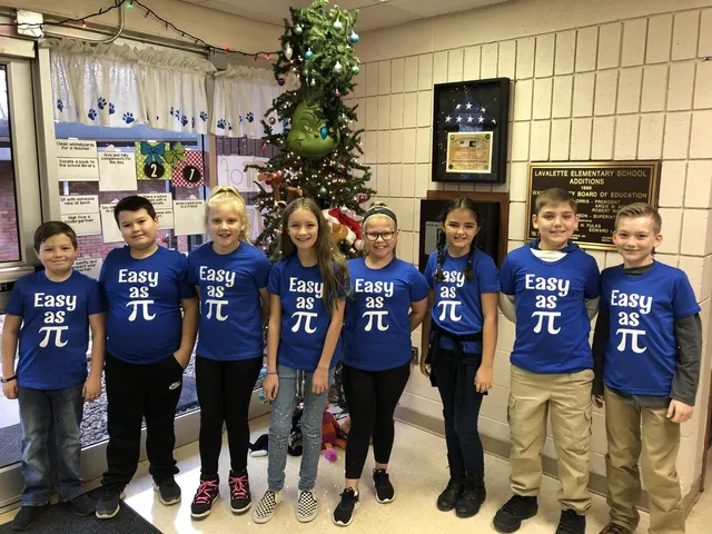 Students wearing easy as numerical pi shirts