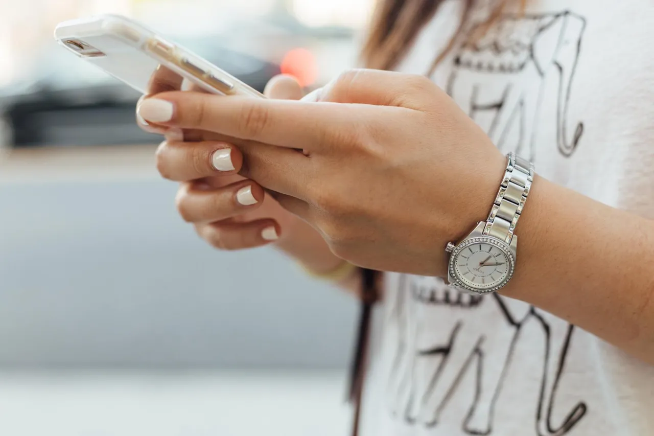 Someone holding a phone