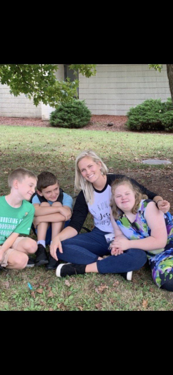 Teacher and students outside