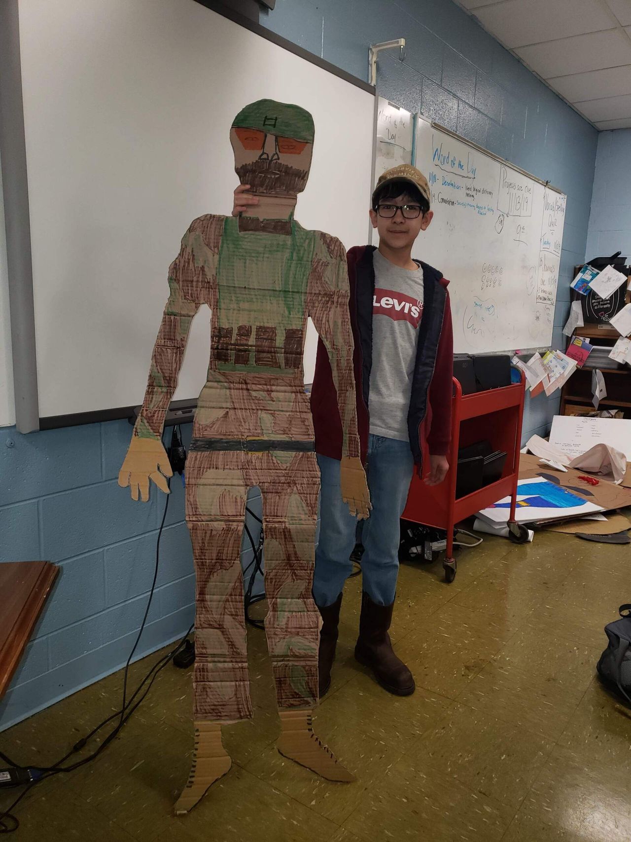 Student by a carboard cutout