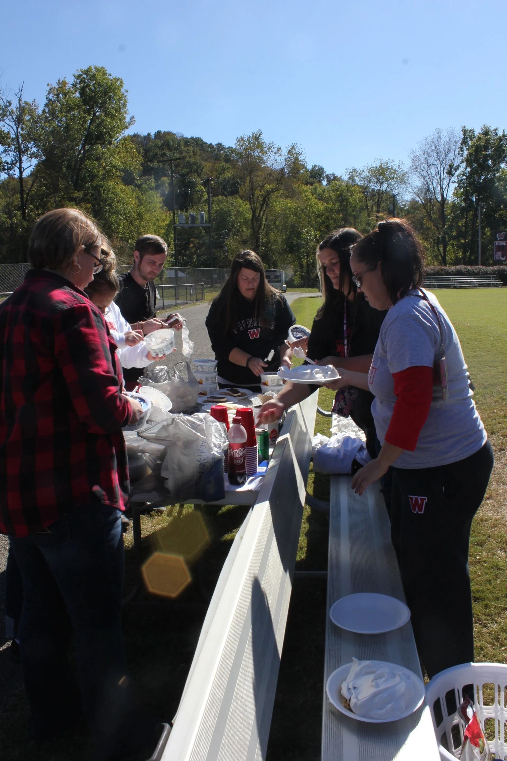 Volunteers setting up a table