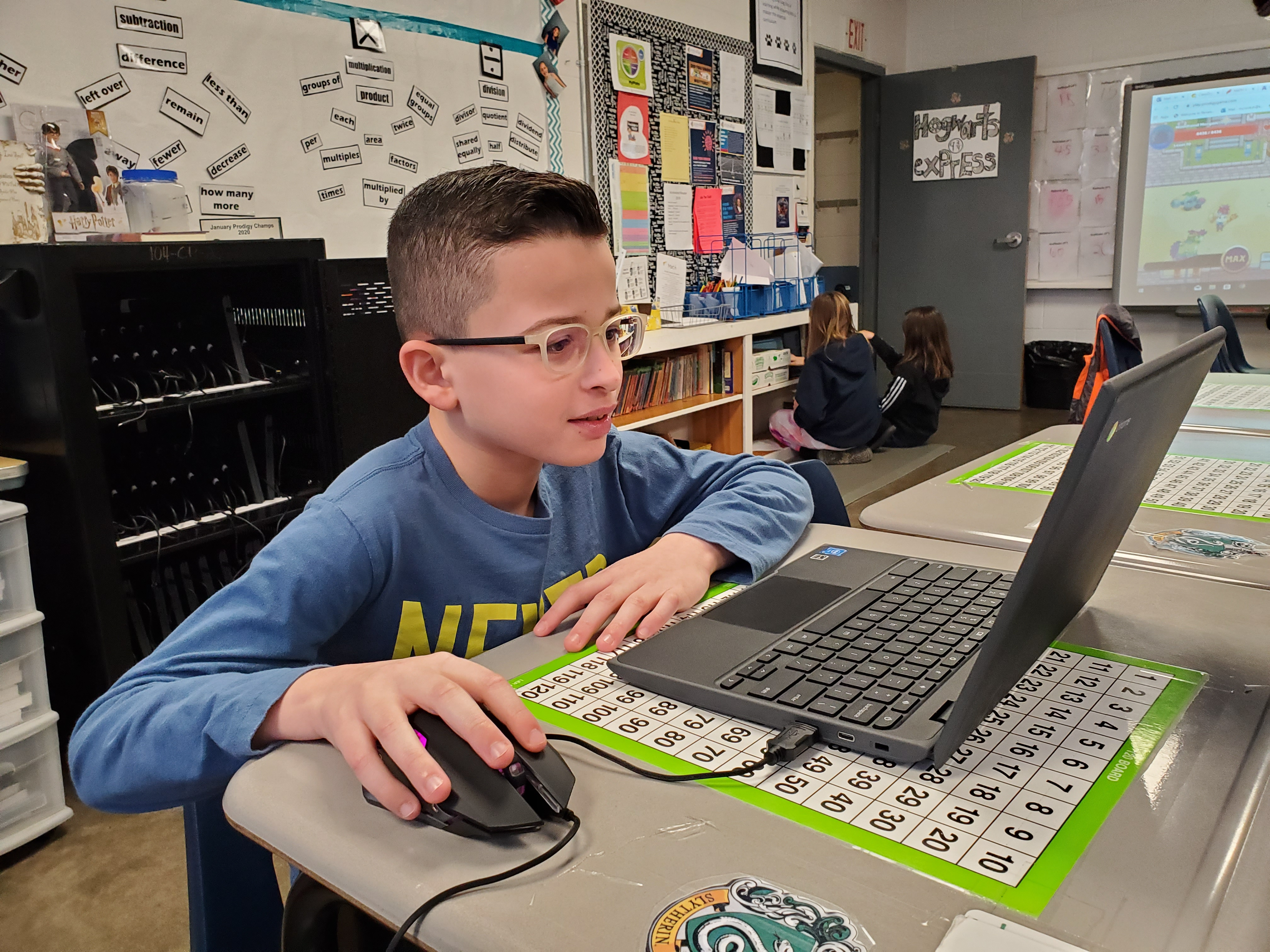 student with chromebook